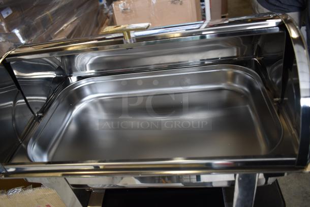Brand new Choice Deluxe 8 Qt. Roll Top Chafer with gold accents. Scratch and dent condition. Includes two chafers.