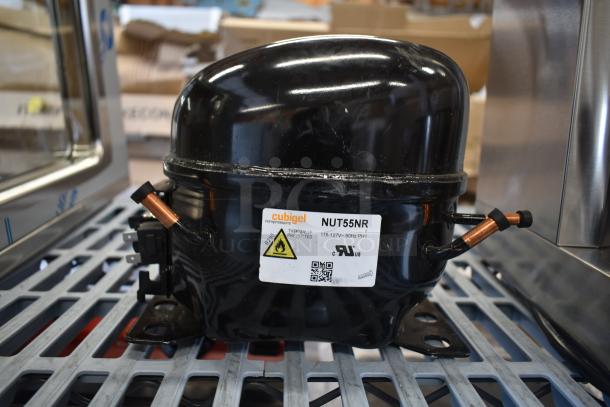 Brand new Cubigel NUT55NR compressor, slight scratches, for Avantco and UBB/UDD series. Label: 115-127V, 60Hz, R290.