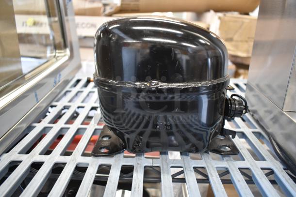 BRAND NEW Cubigel NUT55NR Compressor, for Avantco models, scratch and dent, black, model marking visible.