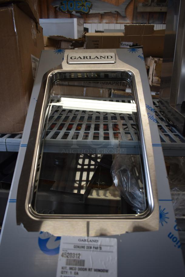Brand new Garland kit, model 4520312, MCO door with right window, stainless steel, minor scratches, genuine OEM part.