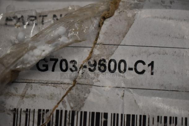 Barcode label showing part number G703-9600-C1, indicating a scratch and dent griddle top, brand new condition.