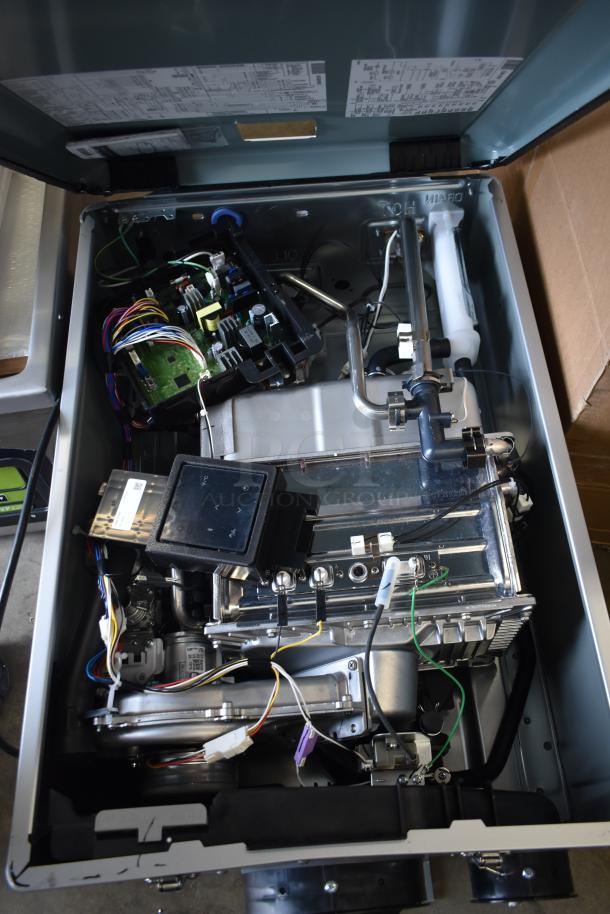 Brand new Rinnai RX199iN tankless water heater showing internal components; 199,000 BTU, 11.0 GPM, natural gas/propane.
