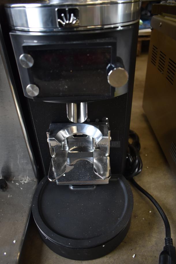 Brand new 2025 Mahlkonig E65W GBS espresso grinder, 2.6 lb. capacity, black, scratch and dent, 120V, 1 phase.