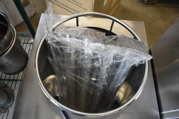 Brand new CPG WOKR13L liquid propane wok range with 13" ring, 95,000 BTU; visible packaging, minor scratches, dents.