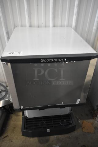 Brand new Scotsman HID525AB-1A Meridian ice machine with minor dents, 25 lb. bin storage, push button dispensing.