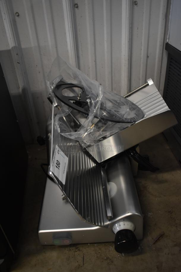 Brand new Avantco 177SL312 12" manual meat slicer, 115V, 1 phase, with minor scratches and dents, labeled with item 180.