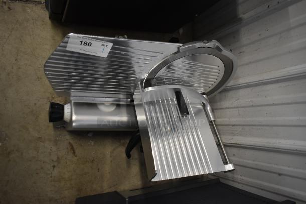 Brand new Avantco 177SL312 12" meat slicer with manual gravity feed. Features scratch and dent condition. 115V, 1 phase.