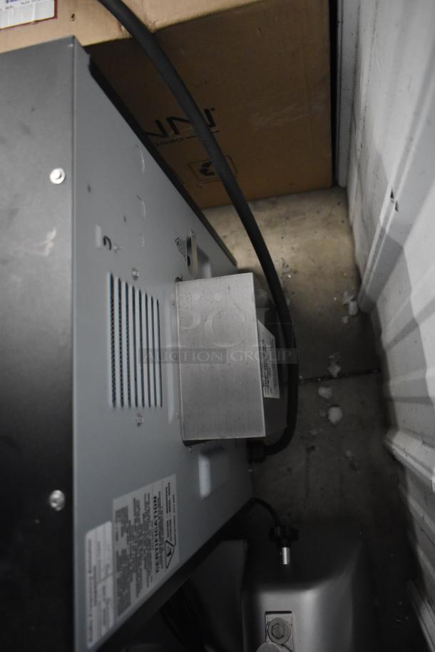 Brand new 2025 Merrychef eikon e1s countertop oven, 208/240V, 1 Phase, showing rear panel with ventilation grates and power cord.