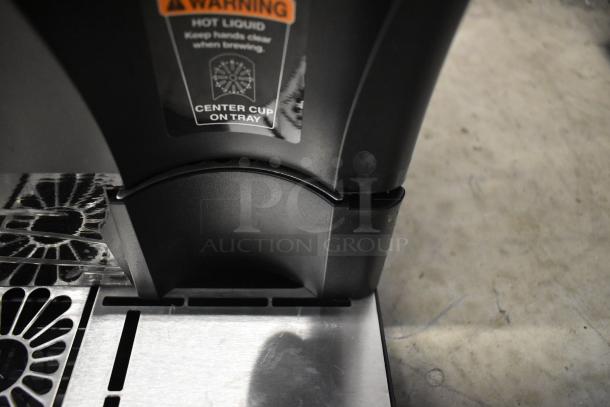 BRAND NEW SCRATCH AND DENT Bunn 44500.0000 My Cafe MCO Single Serve Brewer. Visible warning label. Condition shows minor wear.