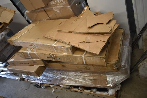 7 new Bunn items with scratch and dent, including tables, in sealed and damaged cardboard boxes on a pallet.