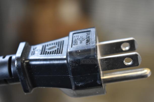 Close-up of a power plug for the Rinnai CX199i SENSEI tankless water heater. Black plug with markings visible.