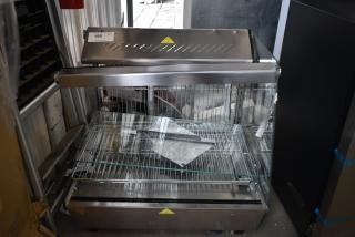 ServIt 423HDM26SA 26" heated display case, new with broken glass, 3 shelves, sliding doors, 120V, countertop model.