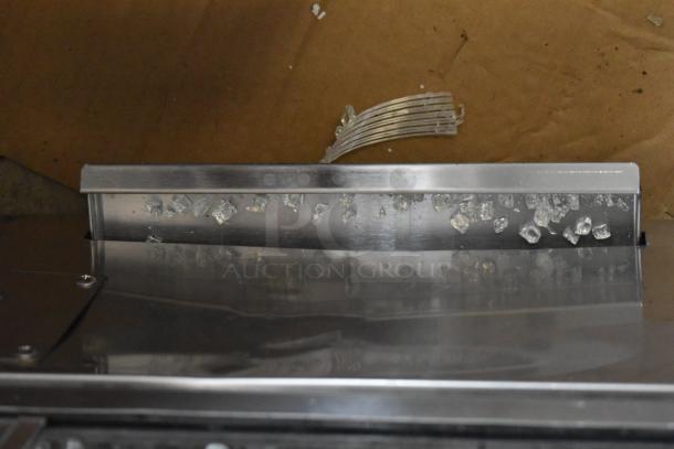 ServIt 423HDM26SA heated display case with broken glass visible; 26" self/full service, 3 shelves, 120V, 1 phase.