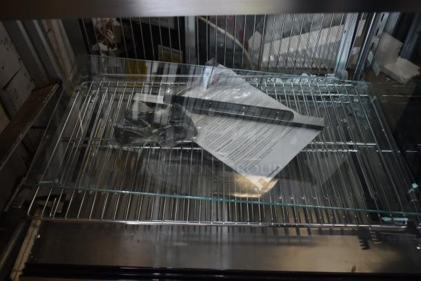 Brand new ServIt 423HDM26SA 26" display case with broken glass. Three shelves, sliding doors, 120V, 1 phase.