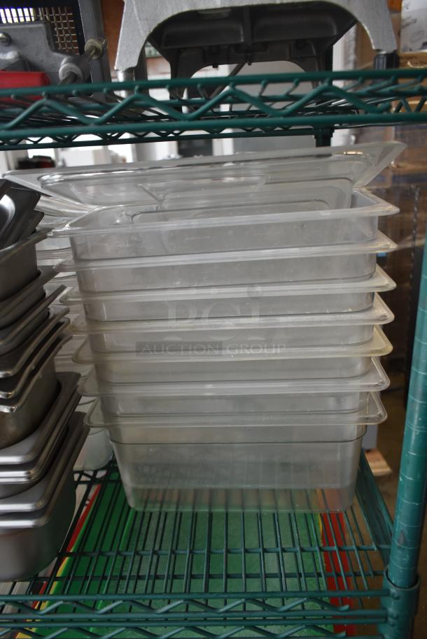 Tiered lot of poly drop-in bins and stainless steel containers on a metal shelf, various sizes, used condition.