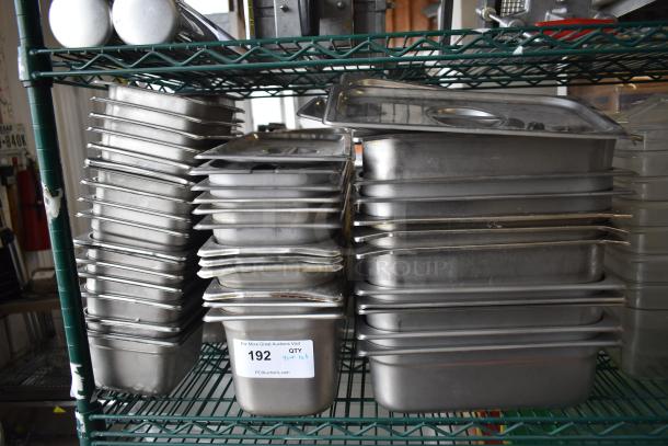 Stainless steel and poly drop-in bins on shelves, labeled "Tier Lot." Mixed condition, tag reads "192" for auction.