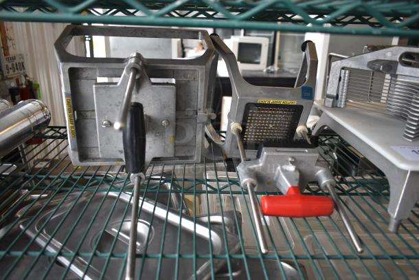 Lettuce head cutter and vegetable cutter on metal shelf; metal build with sharp blades warning label, red handle grip.