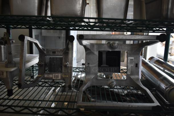 Metal lettuce head cutter and vegetable cutter on shelves, in good condition. Includes grid blades and visible product labels.