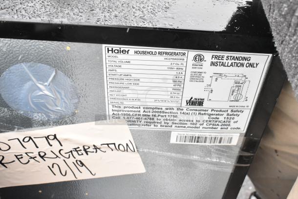 Haier HC27SW20RB label, 2.7 cu. ft. mini cooler, 115V, R600a refrigerant, made in China, free-standing installation, model info.