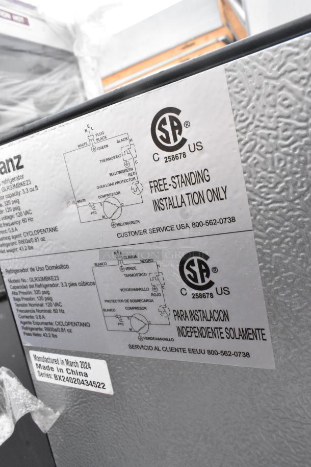 Four mini coolers including Haier HC27SW20RB, Galanz GL27BK, Magic Chef HMDR450SE. 120V, 1 Phase. Labels with CSA certification.