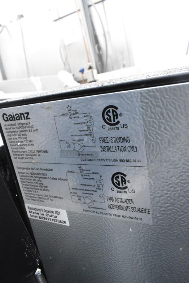 Galanz mini cooler label, model GLR33MS1E02, 3.3 cu. ft., 120V, free-standing installation only. Made in China.