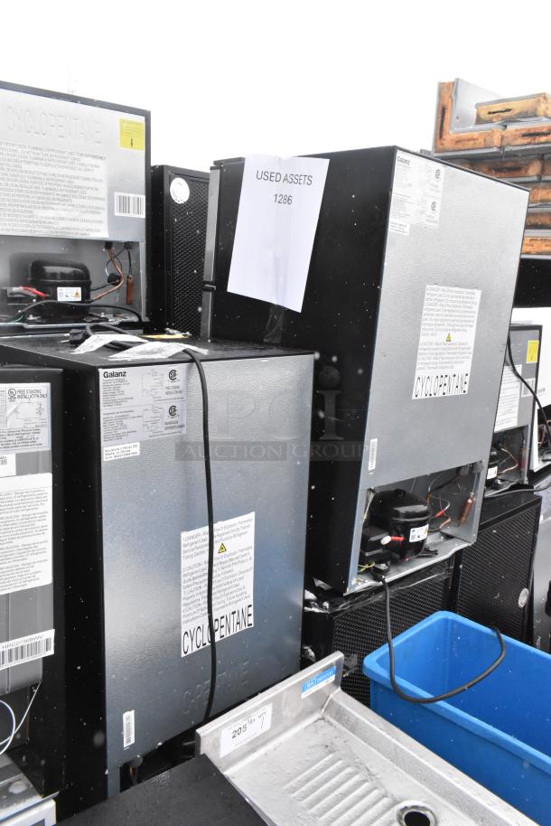 Nine mini coolers, including Galanz GLR33MBKE23 and GLR31TS1E02 models. Used, 120 volts, 1 phase. Tags show model details.