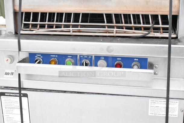 LVO FL14E stainless steel pot and pan washer, 460V, 3 Phase, floor-style, front load, controls visible, instructions label.