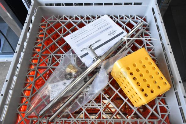 Mainstreet 541HTUC30 dishwasher parts, including pipes, yellow holder, and manuals. New condition with scratch and dent.