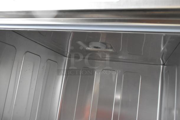 Brand new Mainstreet 541HTUC30 high-temp undercounter dishwasher interior. 208V/240V, 1 phase. Scratch and dent.