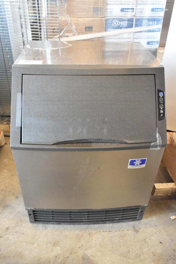 Manitowoc UYF0140A-161B undercounter ice machine, new, with 90 lb. bin, visible scratch, 115V, 1 phase, half dice cubes.