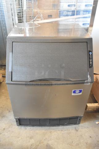 Manitowoc UYF0140A-161B undercounter ice machine, new, with 90 lb. bin, visible scratch, 115V, 1 phase, half dice cubes.