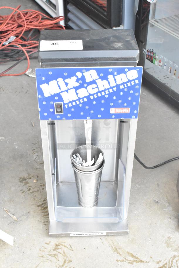Vita-Mix VM0800A Commercial Countertop Frozen Drink Mixer, 120V, 1 Phase, with visible "Mix'n Machine" branding, includes agitator and metal cup.