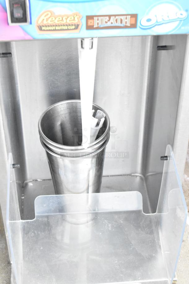 Vita-Mix VM0800A commercial frozen drink mixer, 120V, 1 phase, features stainless steel blending container and branding labels.