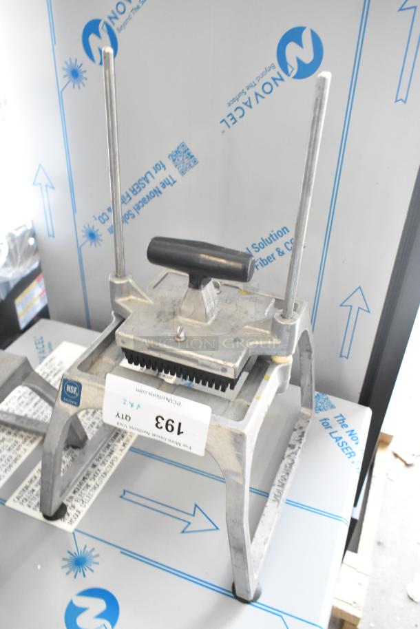 Heavy-duty lettuce head cutter with stainless steel blades and ergonomic handle. Includes manufacturer's label and NSF certification.