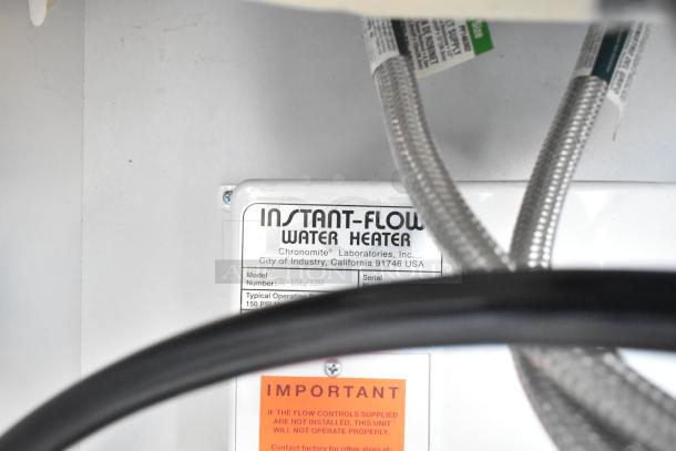 Instant-Flow Water Heater label; model SR-15L/120 by Chronomite Laboratories. Includes important installation notice.
