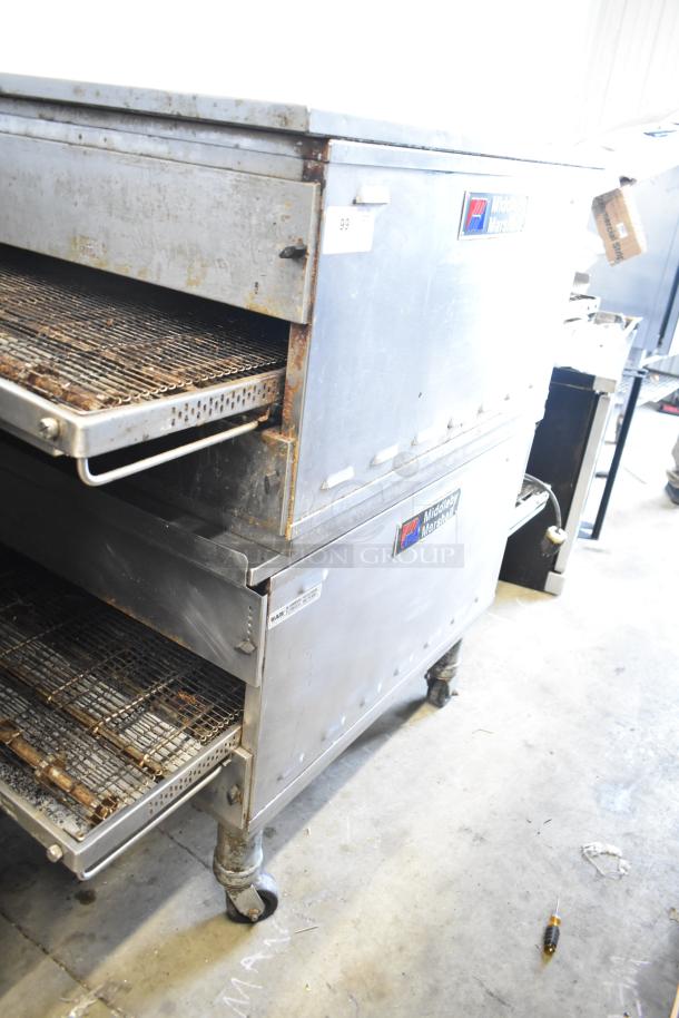 Middleby Marshall PS638G commercial conveyor pizza ovens, natural gas, 89,000 BTU, on casters, visible wear, model labels intact.