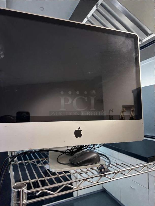 Apple iMac 21.5-Inch all-in-one desktop, excellent condition, fully operational, includes wired mouse, model APL-M-IMAC-0381.