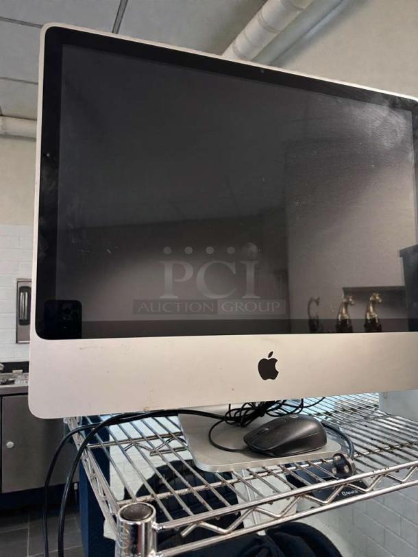 Apple iMac 21.5-Inch all-in-one desktop, excellent condition, fully tested. Model APL-M-IMAC-0381, includes mouse, silver finish.