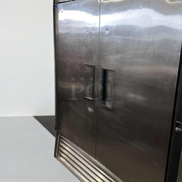 True T-49 commercial reach-in refrigerator, 49 Cu. Ft., stainless steel, 2 solid doors, UL & NSF listed, top-tier condition.