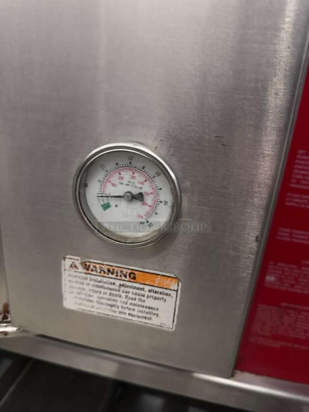 Stainless steel Cleveland Range 24GMK6200 commercial gas steam kettle, like-new condition, NSF & CSA certified, visible gauge and warning label.