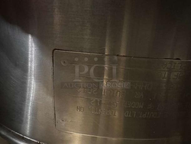Close-up of the Cleveland Range 24GMK6200 commercial gas steam kettle's stainless steel construction, showing engraved model details.