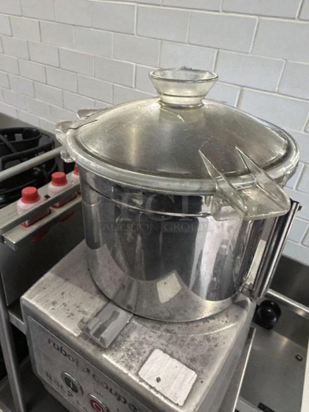 Robot Coupe R602 commercial food processor in stainless steel, premium condition, UL & NSF listed, fully operational.