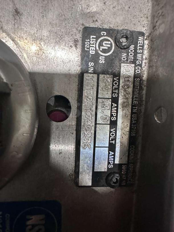 Stainless steel Wells commercial electric soup warmer, model WEL-M-HSOU-0401. UL & NSF listed, pristine condition, fully operational.