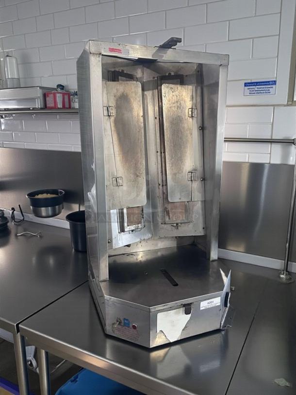 Optimal Automatics 3PG gas doner broiler, excellent condition, UL listed, stainless steel, fully tested and operational.