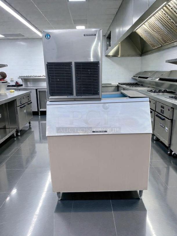 Hoshizaki E-1001MAH modular ice maker with storage bin, excellent condition, air-cooled, UL & NSF listed, tested operational.