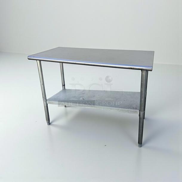 Commercial stainless steel work table, 48"x24", with undershelf, refined condition, NSF certified, fully tested.