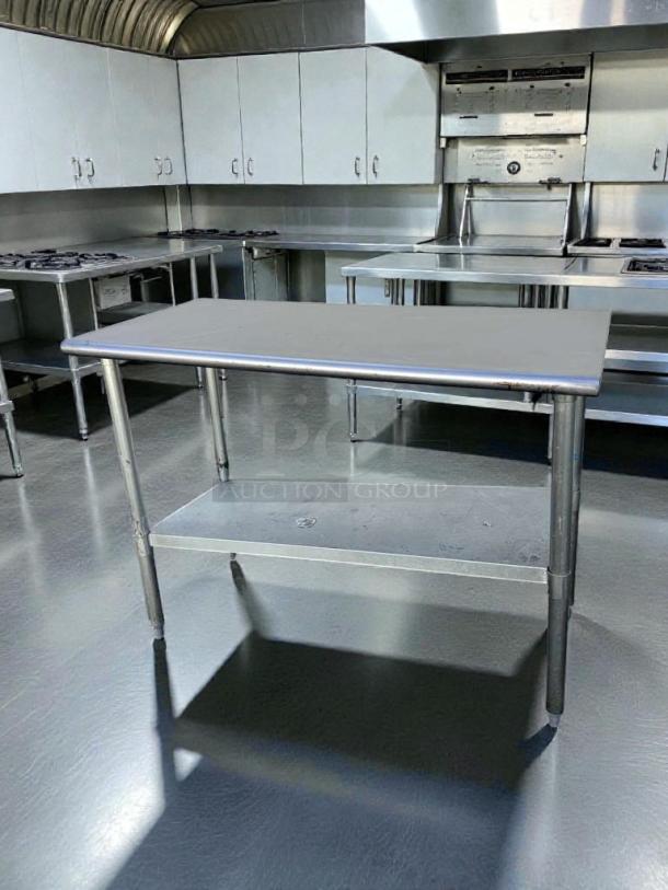 Commercial stainless steel work table with undershelf, 48"x24", NSF certified, excellent condition, fully tested.