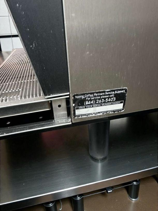 Thermoplan Black&White 3 automatic espresso machine, premium condition, stainless steel, UL & NSF listed, service label visible.