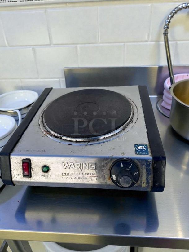 Waring WEB300 commercial single burner hot plate, excellent condition, 120V UL listed. Features adjustable temperature knob and indicator lights.