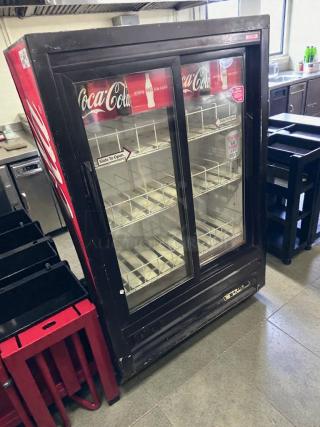 Coca-Cola branded True GDM-33SL-54EM-LD glass door merchandiser refrigerator, 54", premium condition, UL Listed.
